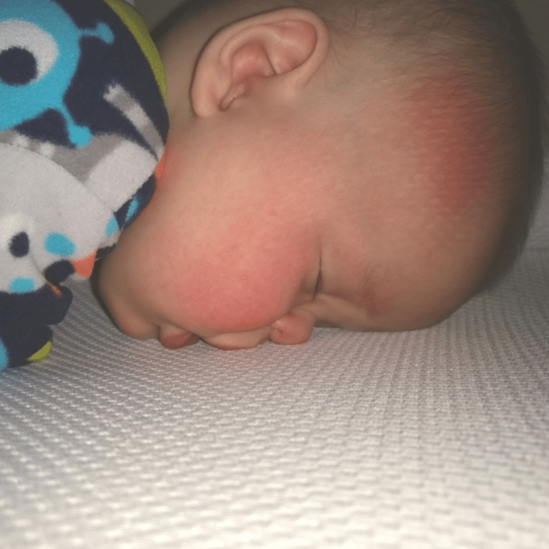 Face down on breathable crib mattress